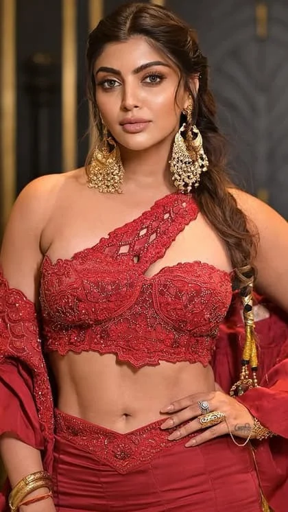 Akanksha Puri in a red outfit